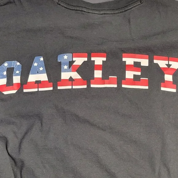 OAKLEY BLACK TSHIRT WITH RED WHITE AND BLUE STARS ABS STRIPES OAKLEY LOGO DESIGN - Picture 5 of 6